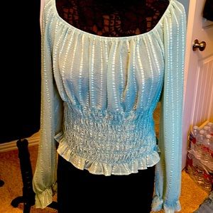 Mint green top with elastic on waist